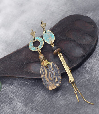 Fossile boucles d'oreilles dépareillées